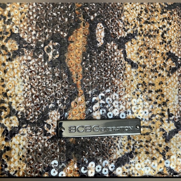 BCBGmaxazria White Glossy Sequined Styled Lazy Clutch in Animal Print Background - Picture 9 of 13